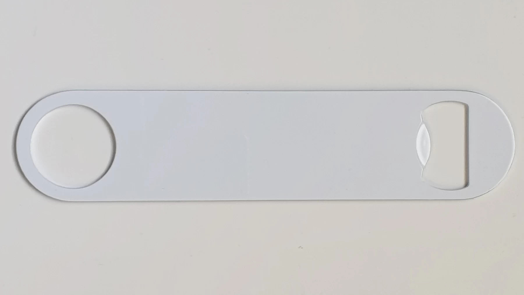 Out of the box merchandise custom white bar blade with no image on it for a before and after comparison image.