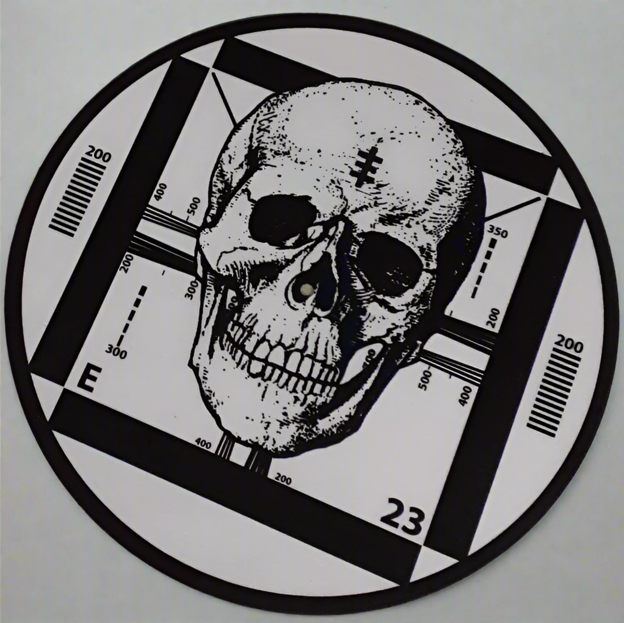 Finished custom slipmat with a skull in black and white.