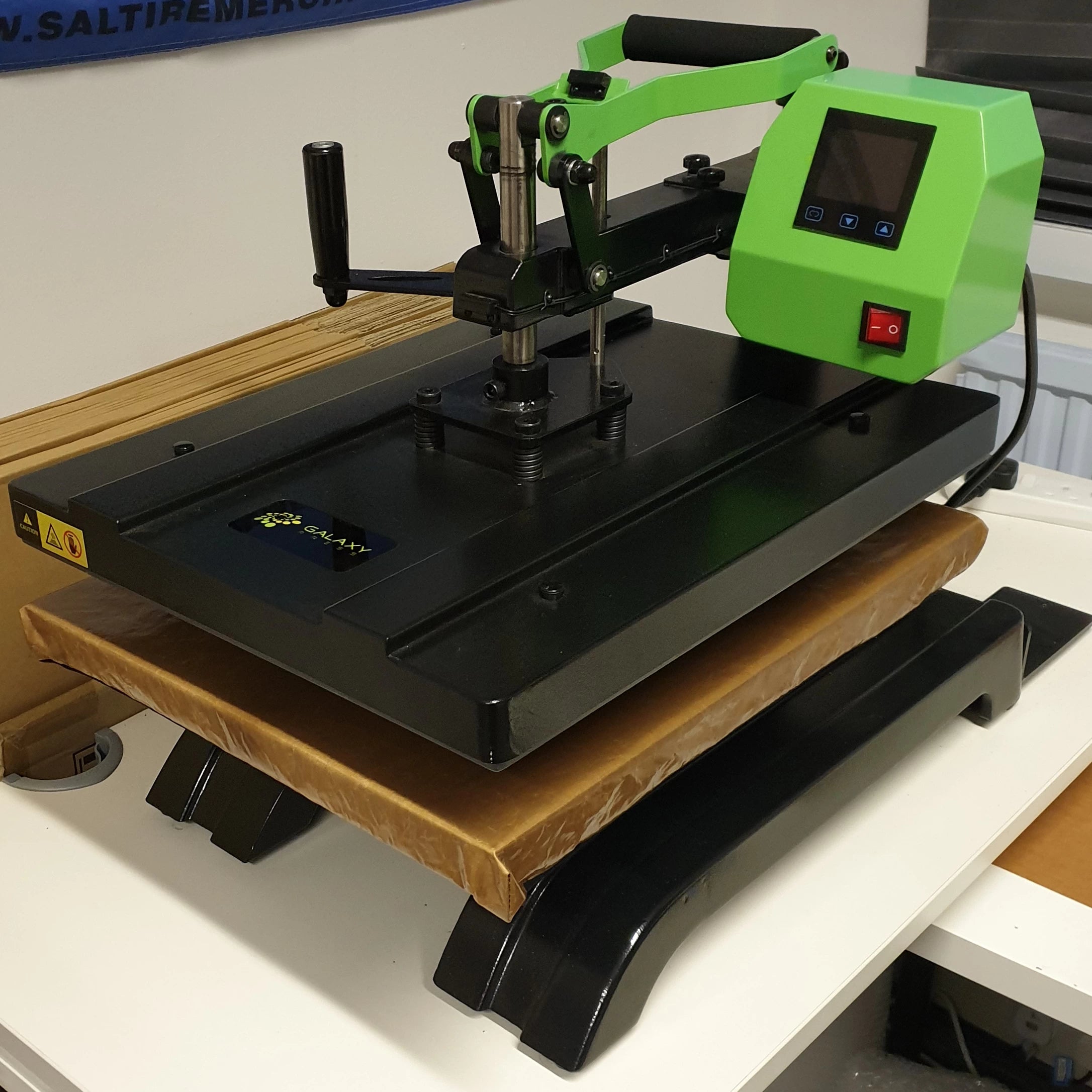 Professional heat press used for making merchandise such as vinyl slipmats.
