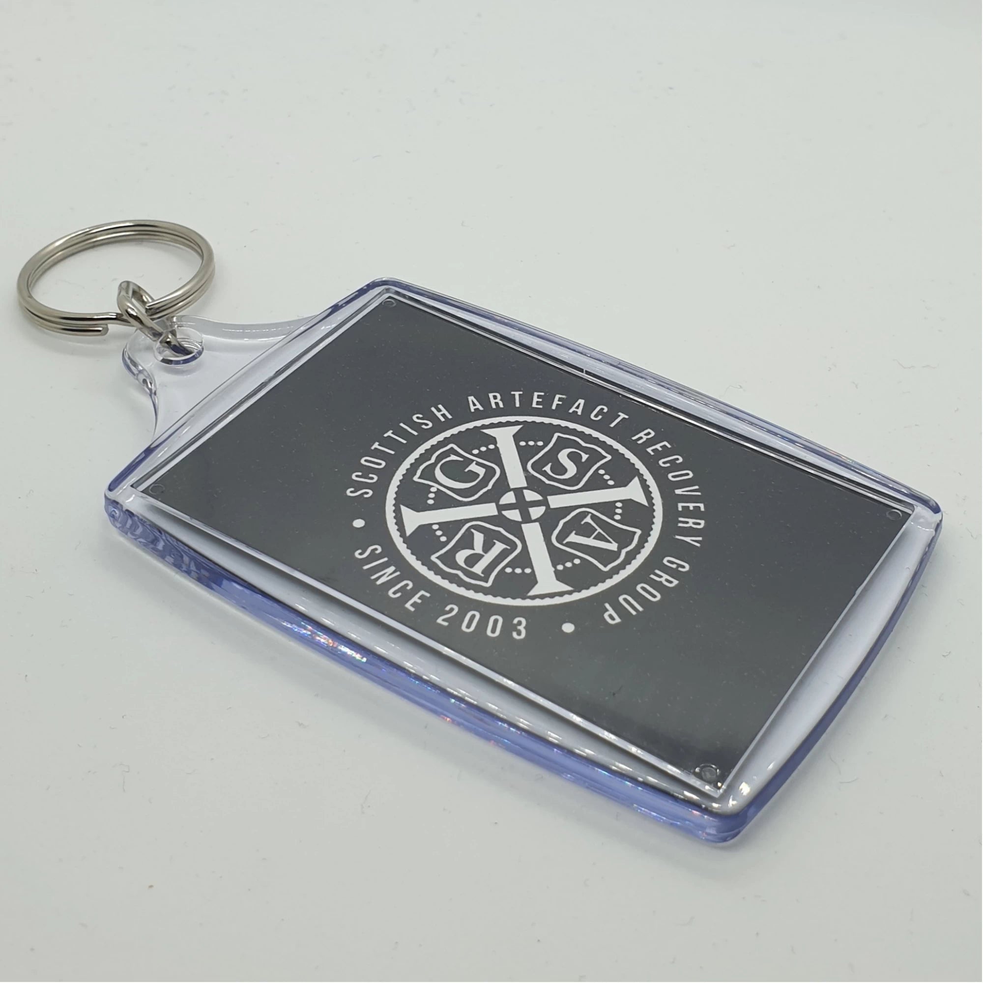 Out of the box merch custom keyrings with a ring for keys.