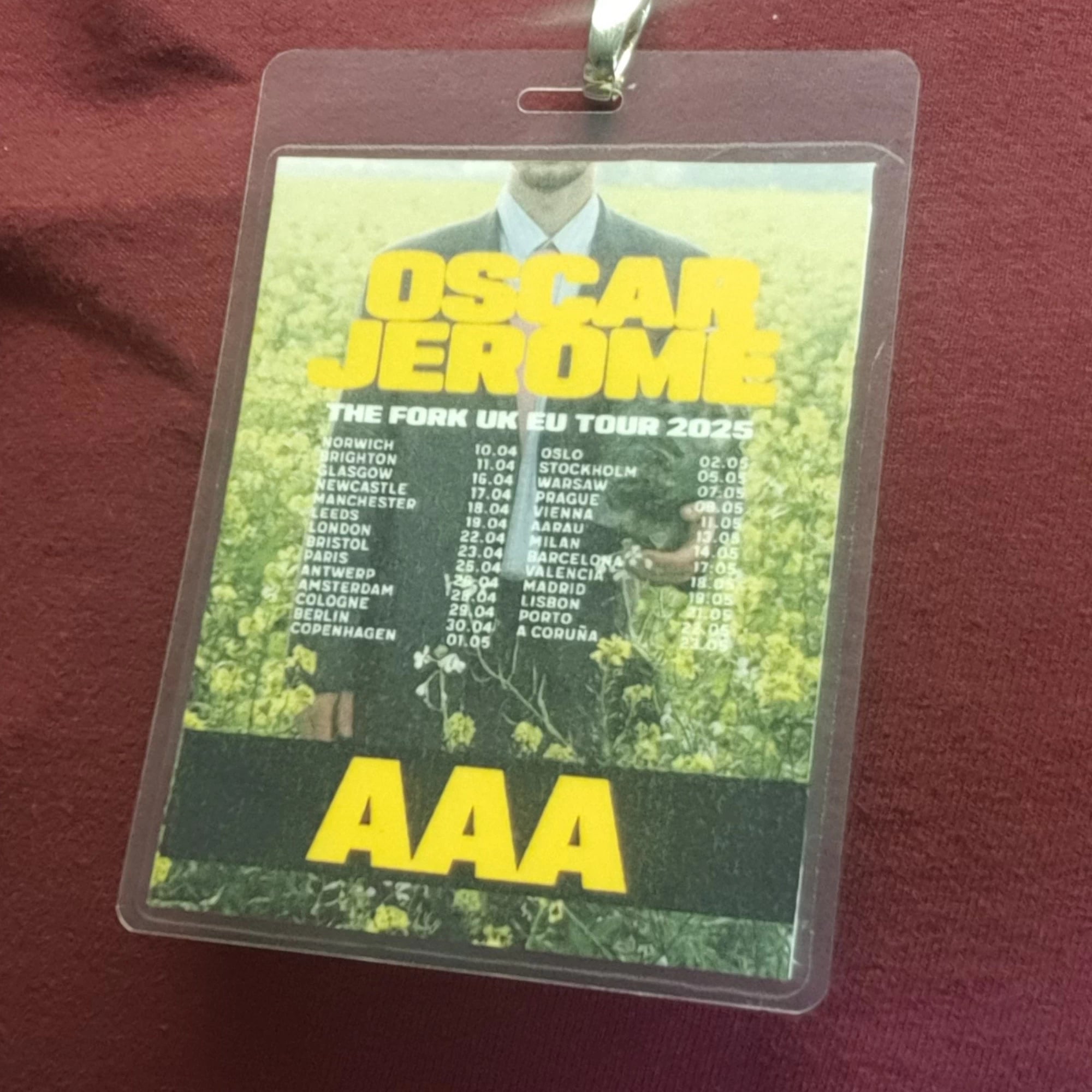 Oscar Jerome concert tour pass with event details on a red background