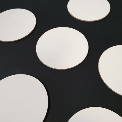 Circular 9cm custom coasters ready for printing band logos onto.